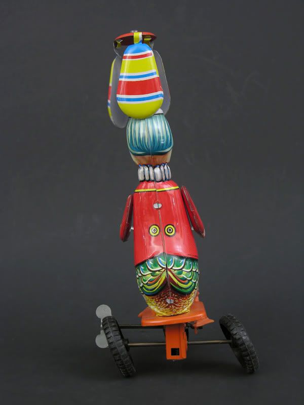 Vintage Tin Wind Up Duck on Bicycle Twirling Hat Made in Western 