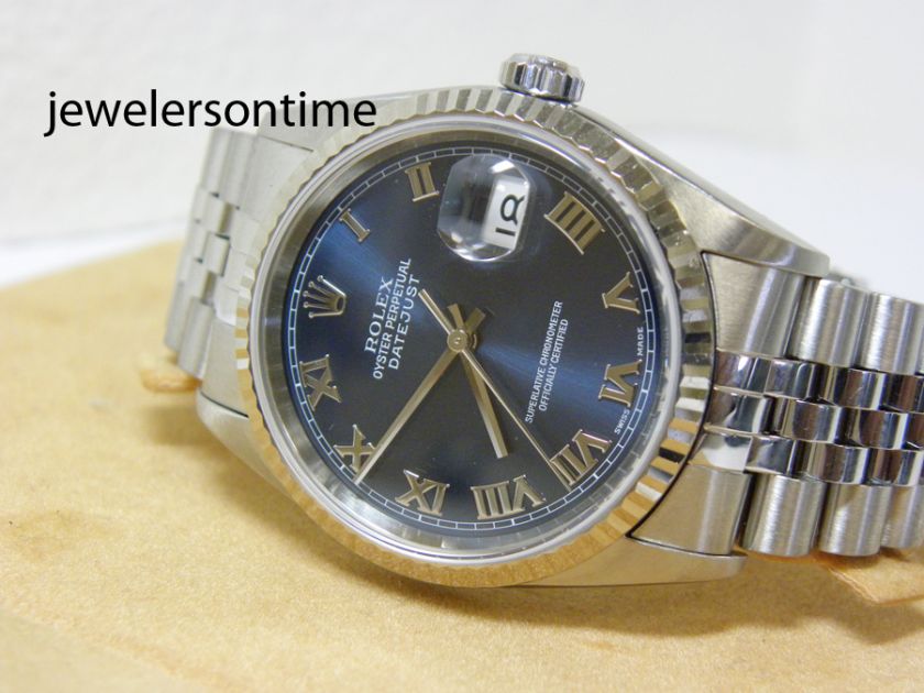 Mint Rolex Mens SS & 18K WG Fluted Bezel. Blue Roman. Jubilee. 36mm 