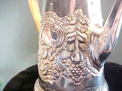 1730 American Coin Silver Repousse Coffeepot. Unusual Decoration