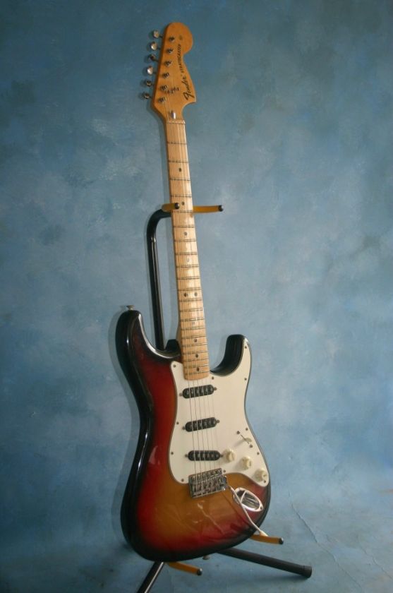   1974, featuringsunburst finished alder body with one piece maple neck