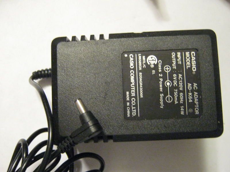 Genuine Casio AC Adaptor AD K64 6VDC 750mA  